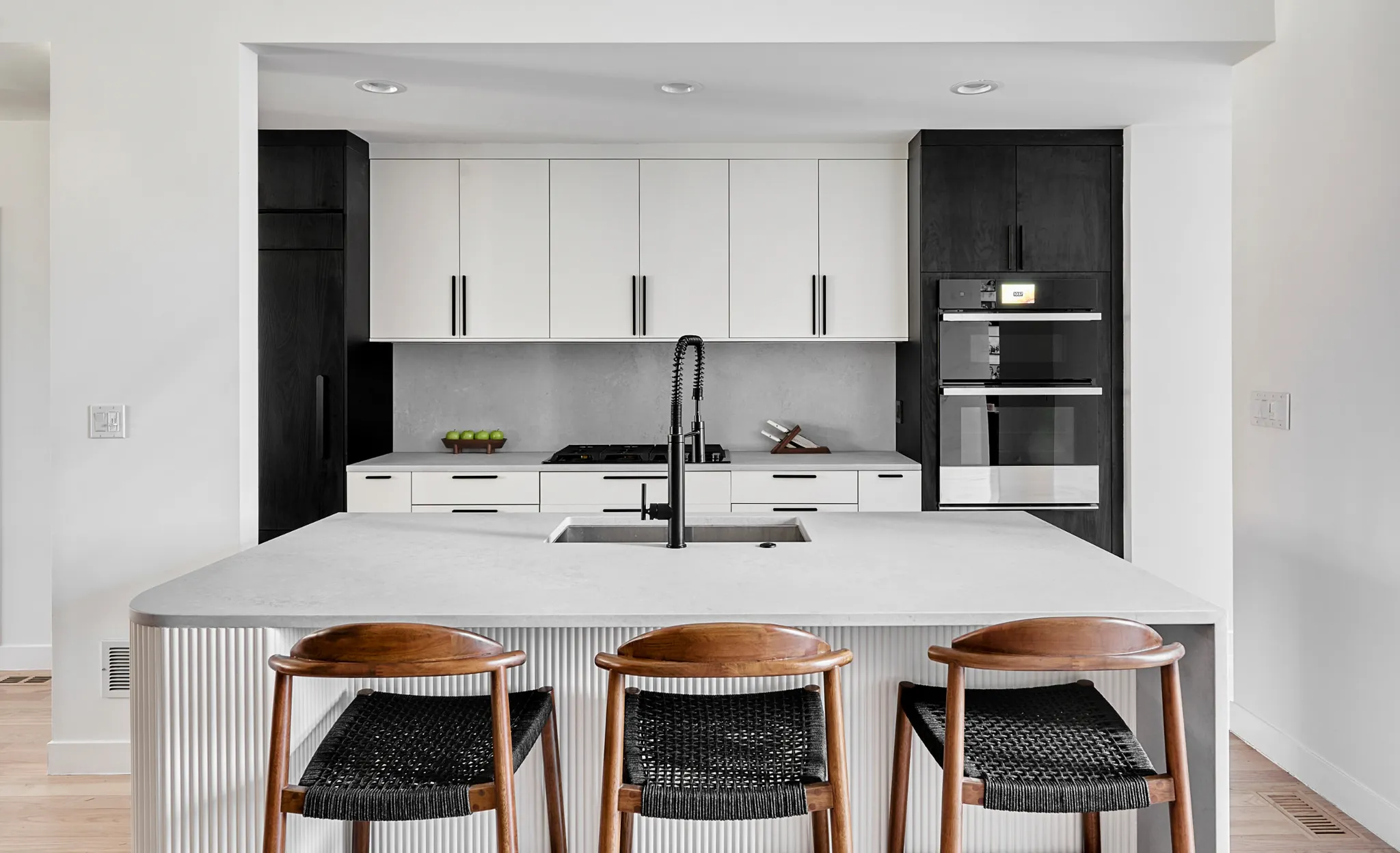 modern kitchen renovation with flat white cabinets in Toronto